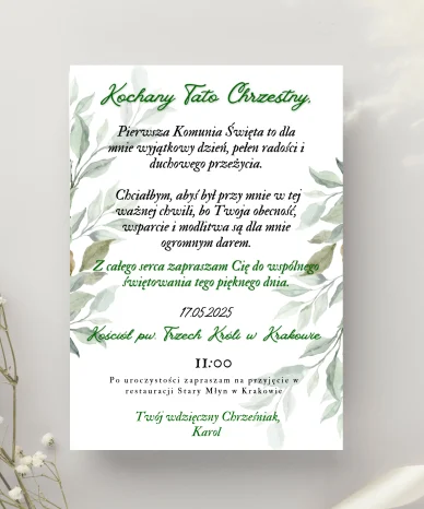 Eleganckie zaproszenie na Pierwszą Komunię Świętą z motywem zielonych liści, adresowane do ojca chrzestnego.